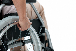 The man handling wheel chair with his hand in Elmwood Park, New Jersey